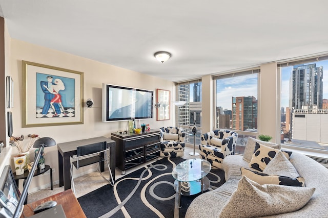 living room with hardwood / wood-style floors and expansive windows