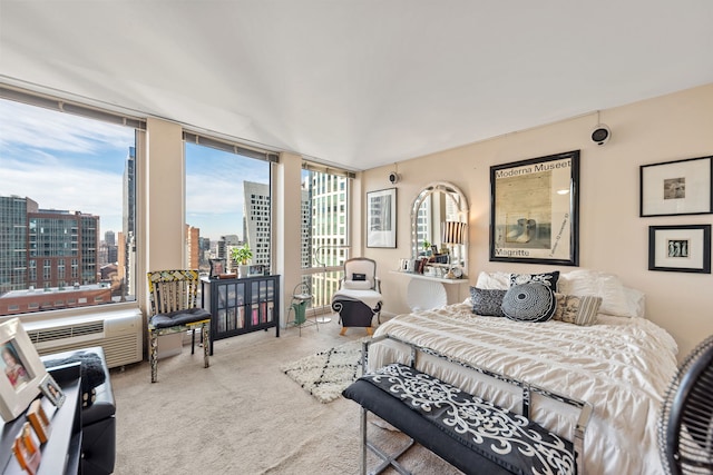 bedroom featuring light carpet and expansive windows