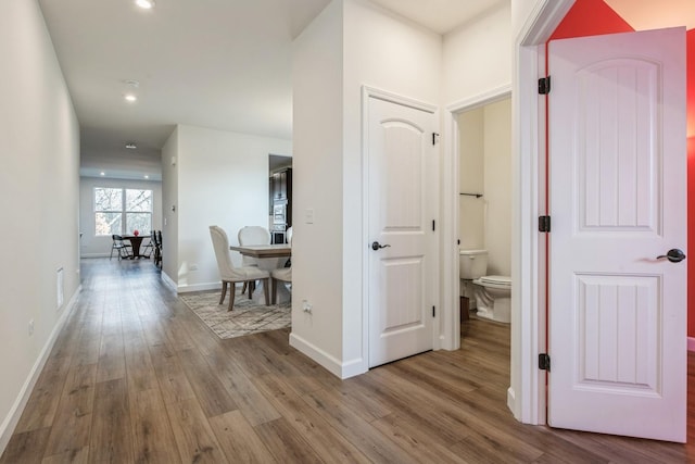 hallway featuring light wood-type flooring