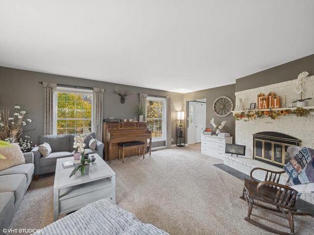 living room with light colored carpet and a brick fireplace