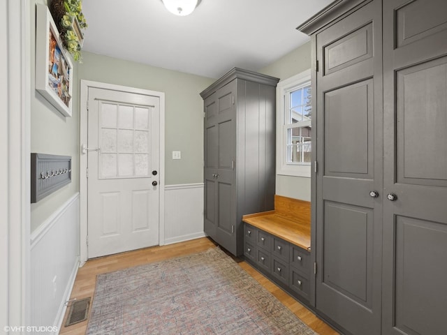 mudroom with hardwood / wood-style flooring