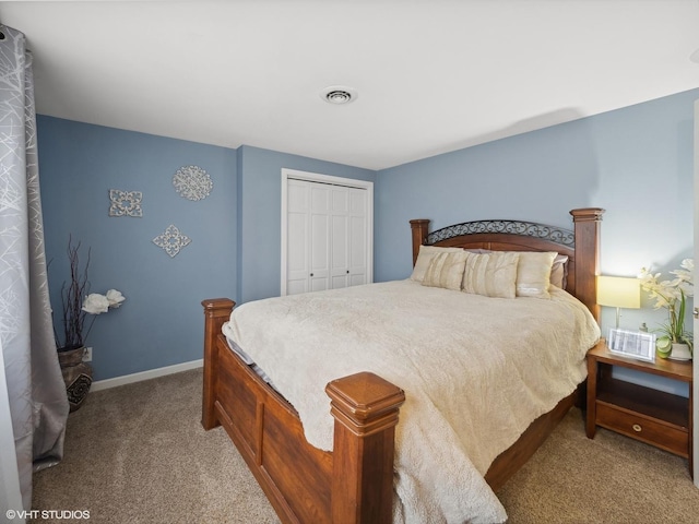 carpeted bedroom featuring a closet