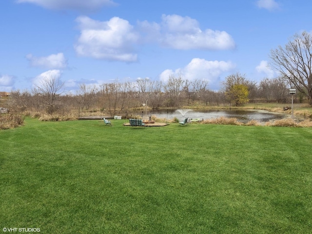 view of yard with a water view