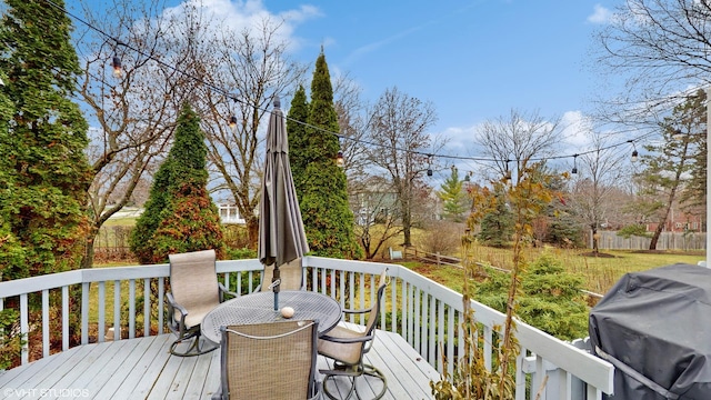 wooden terrace with area for grilling