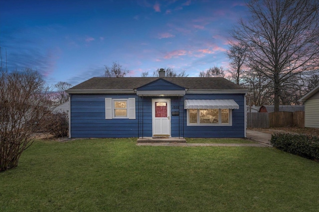 view of front of home featuring a yard