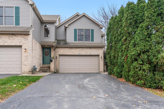 front facade with a garage