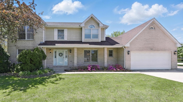 402 Hillandale Dr, Bartlett, IL 60103 - traditional-style house with a garage, brick siding, driveway, a front lawn, and a shingled roof