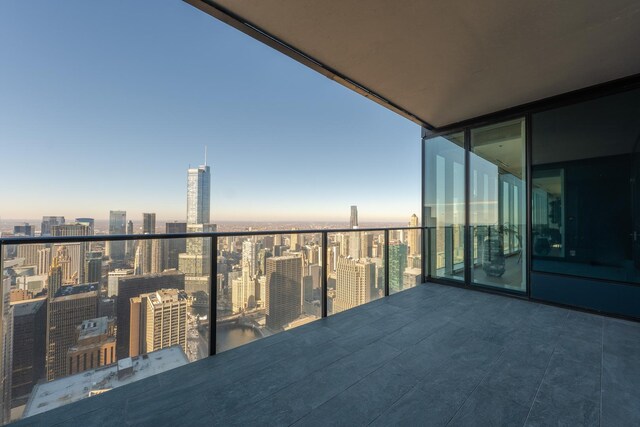 balcony at dusk with a city view