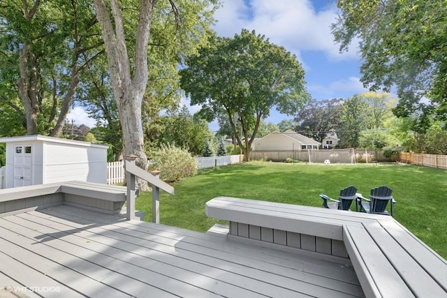 wooden deck with a lawn