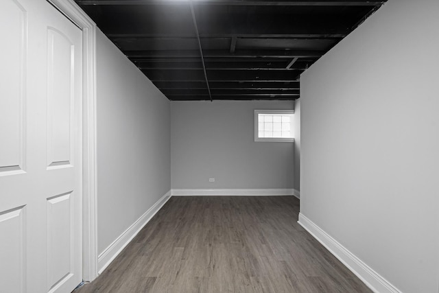 basement featuring hardwood / wood-style floors