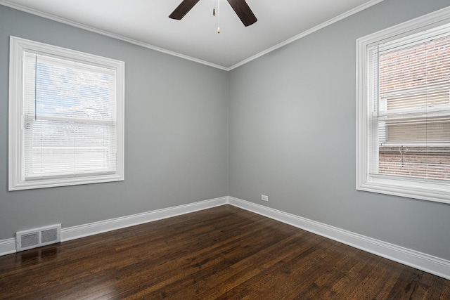 spare room featuring ornamental molding, ceiling fan, and dark hardwood / wood-style flooring