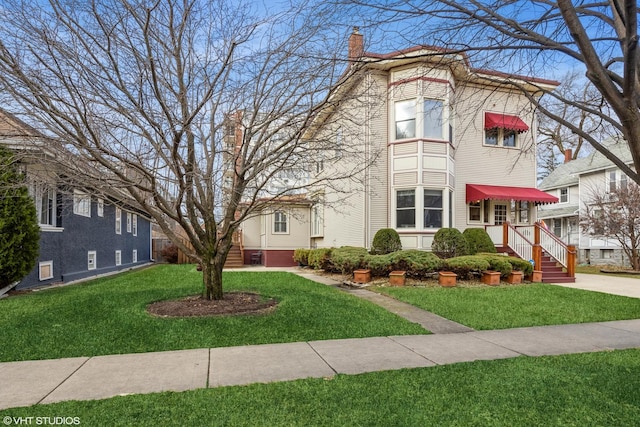 view of front of house with a front yard