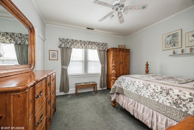 bedroom with dark carpet, ceiling fan, and ornamental molding