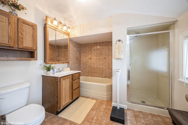 full bathroom with tile patterned flooring, vanity, toilet, and shower with separate bathtub