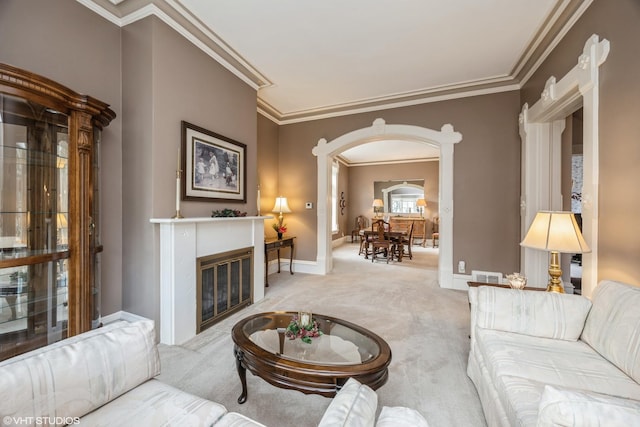 living room featuring carpet and ornamental molding