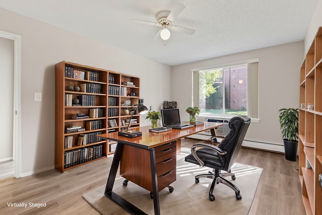 office with ceiling fan, light wood-type flooring, a textured ceiling, and a baseboard heating unit