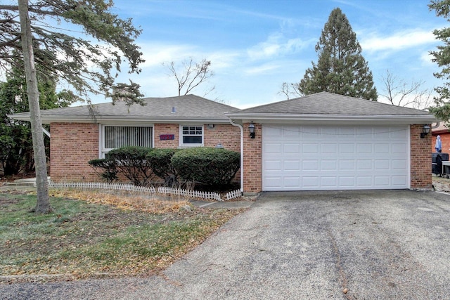 single story home featuring a garage