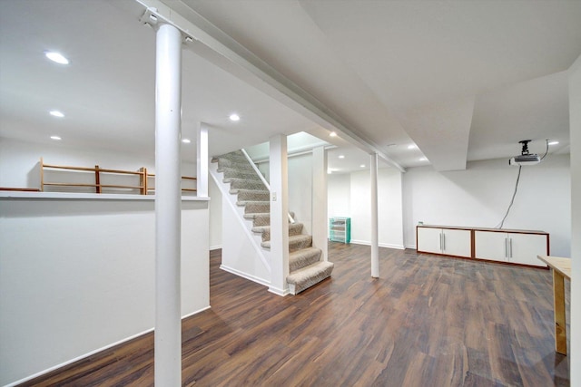 basement featuring dark wood-type flooring