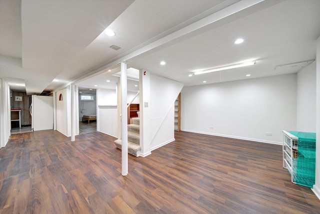 basement featuring dark wood-type flooring