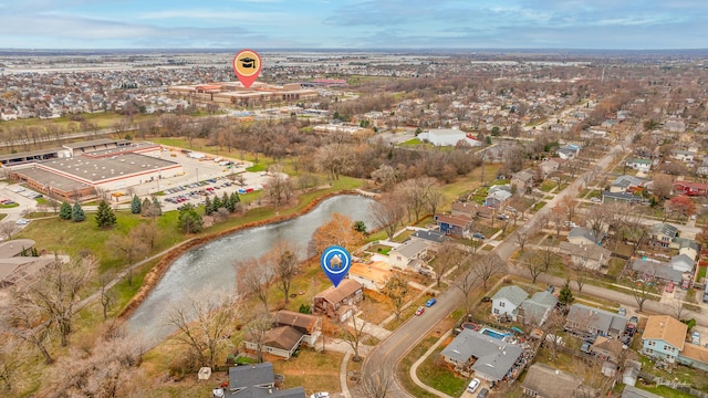 drone / aerial view with a water view