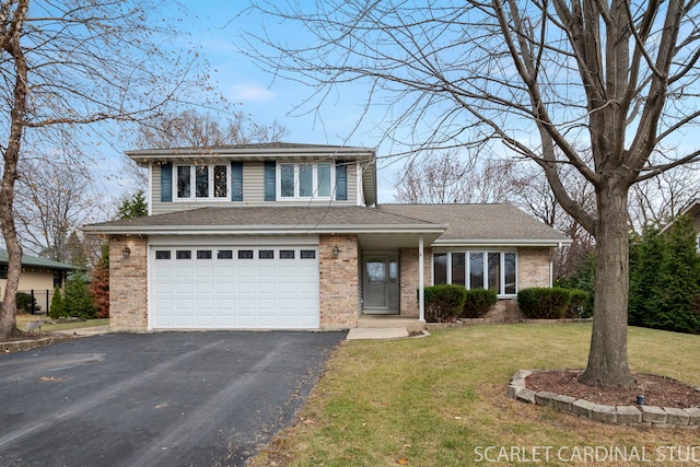 view of front of house featuring a garage and a front yard