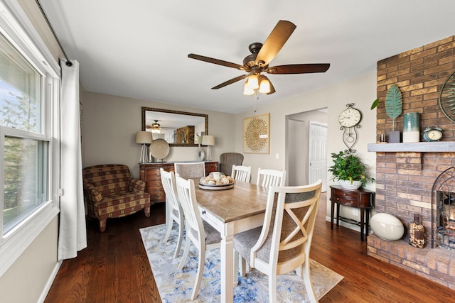 dining space featuring dark hardwood / wood-style floors and ceiling fan