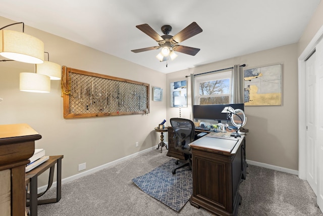 office space with carpet flooring and ceiling fan