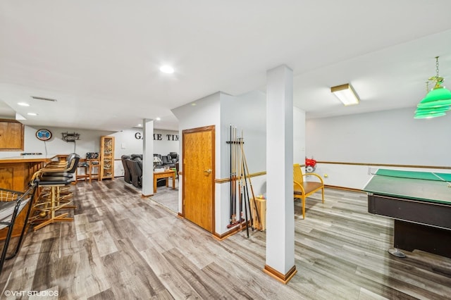 game room featuring recessed lighting, pool table, visible vents, a bar, and wood finished floors