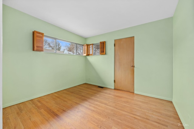 empty room with light wood-type flooring