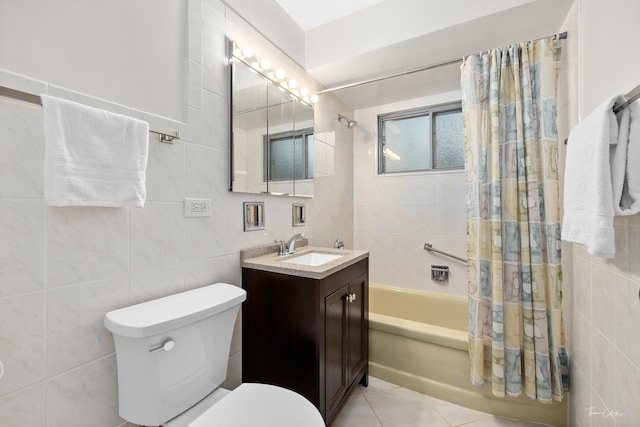 full bathroom featuring vanity, tile patterned flooring, toilet, tile walls, and shower / tub combo with curtain