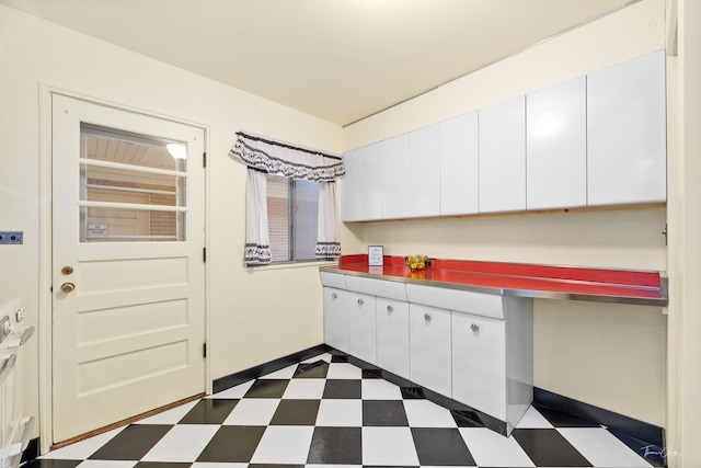 kitchen with white cabinetry