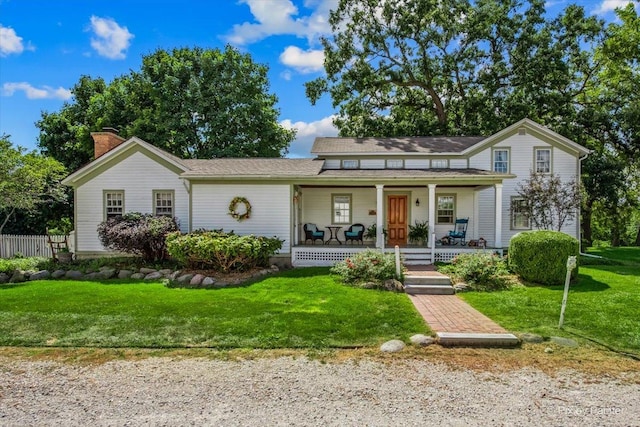 view of front of house featuring a porch and a front yard