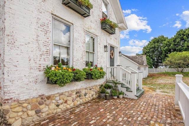 view of home's exterior with a patio area