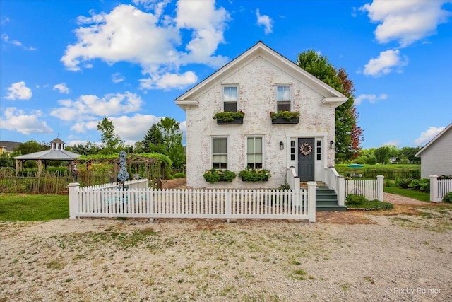 front of property with a gazebo