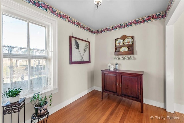 hallway featuring hardwood / wood-style floors