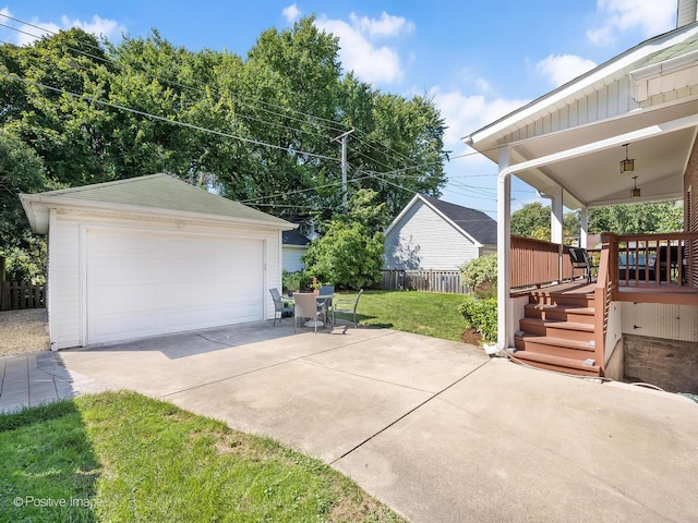 garage with a lawn