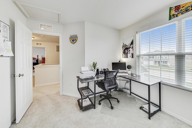 view of carpeted office space