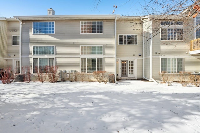 view of snow covered property