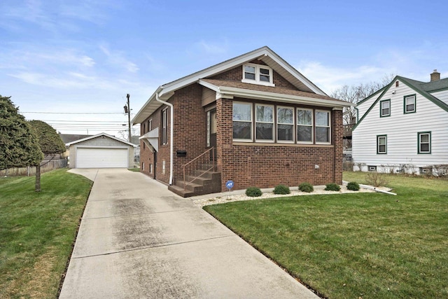 bungalow with a garage, an outdoor structure, and a front lawn