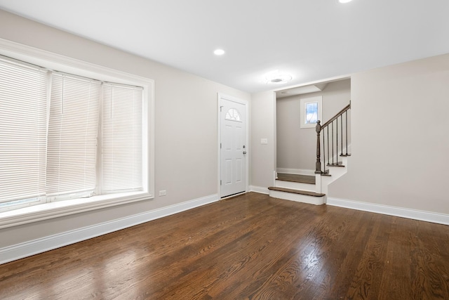 entrance foyer featuring dark wood-type flooring