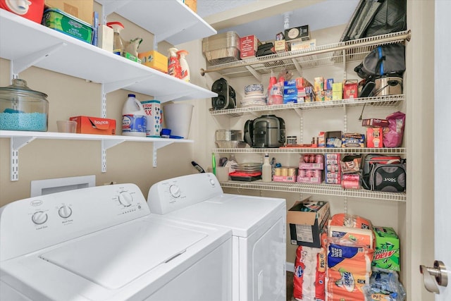 laundry area featuring washer and clothes dryer