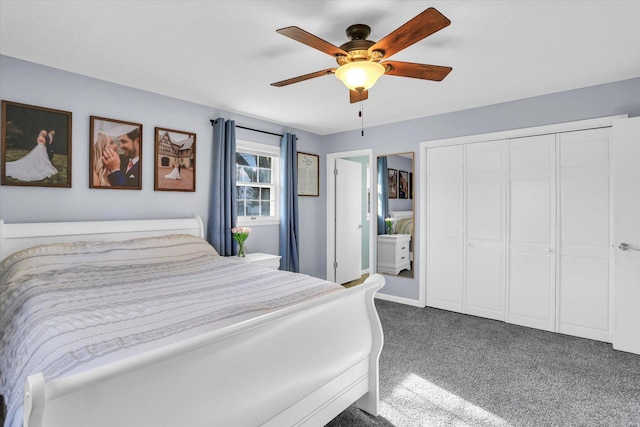 carpeted bedroom featuring ceiling fan and a closet