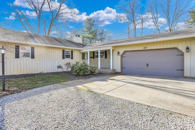 ranch-style home featuring a garage