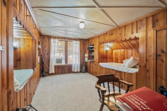 carpeted office space featuring cooling unit and wood walls