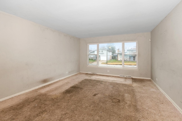 view of carpeted spare room