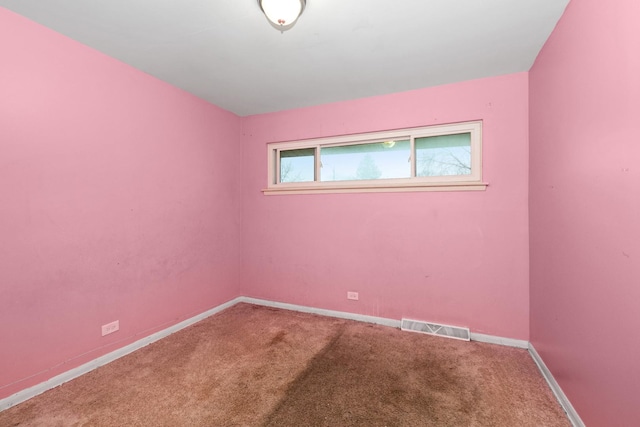 spare room with carpet