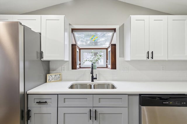 kitchen with white cabinetry, sink, and appliances with stainless steel finishes