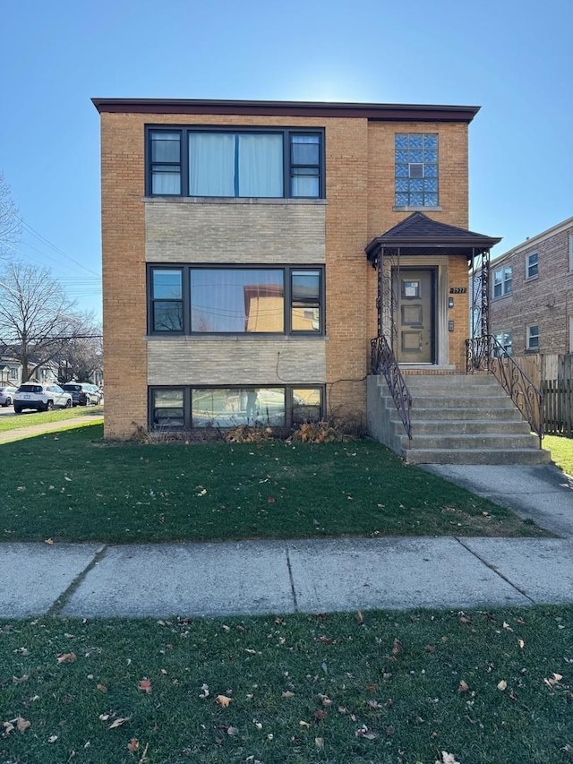 view of front of house with a front yard