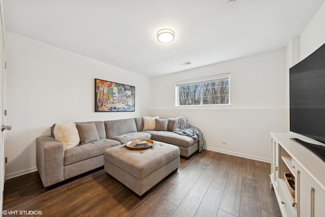 living room featuring dark hardwood / wood-style flooring