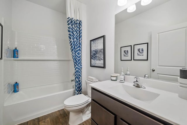 full bathroom with vanity, toilet, wood-type flooring, and shower / bath combo with shower curtain